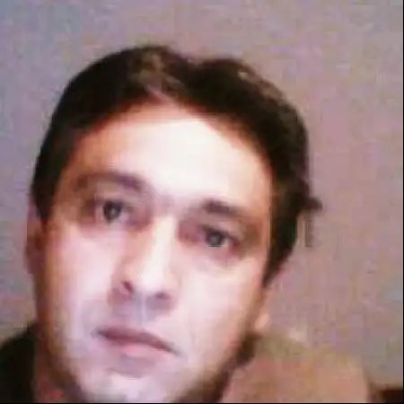 Nikos, 56